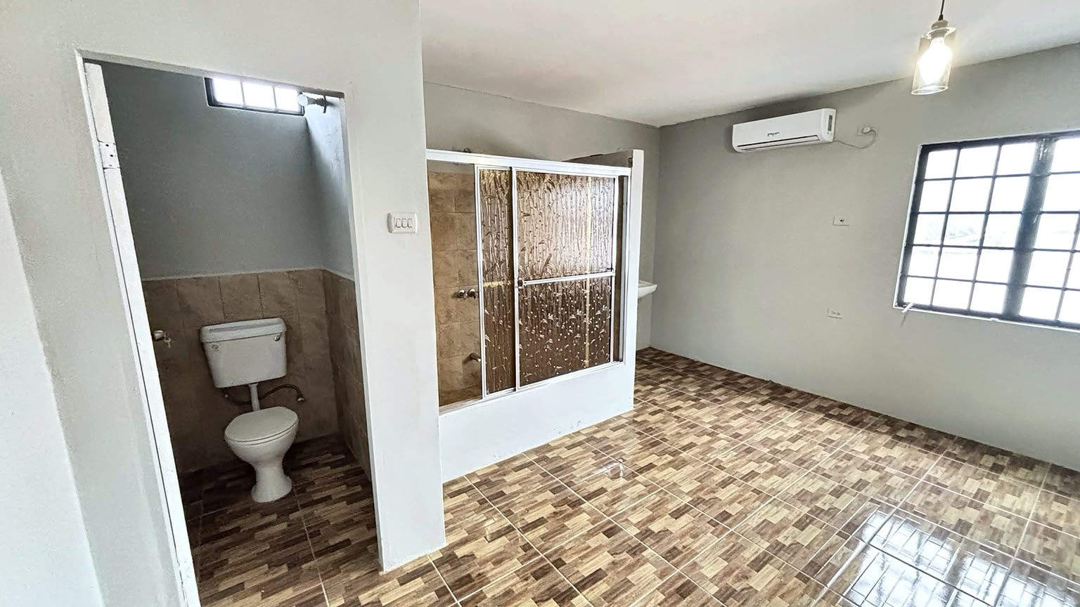 Bedroom inside the Couva North apartment