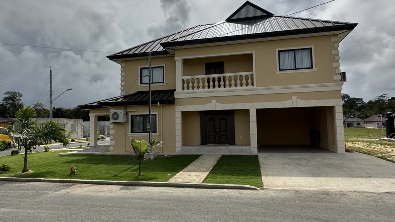 Front exterior of the Ella Vista Gardens residence in Sangre Grande